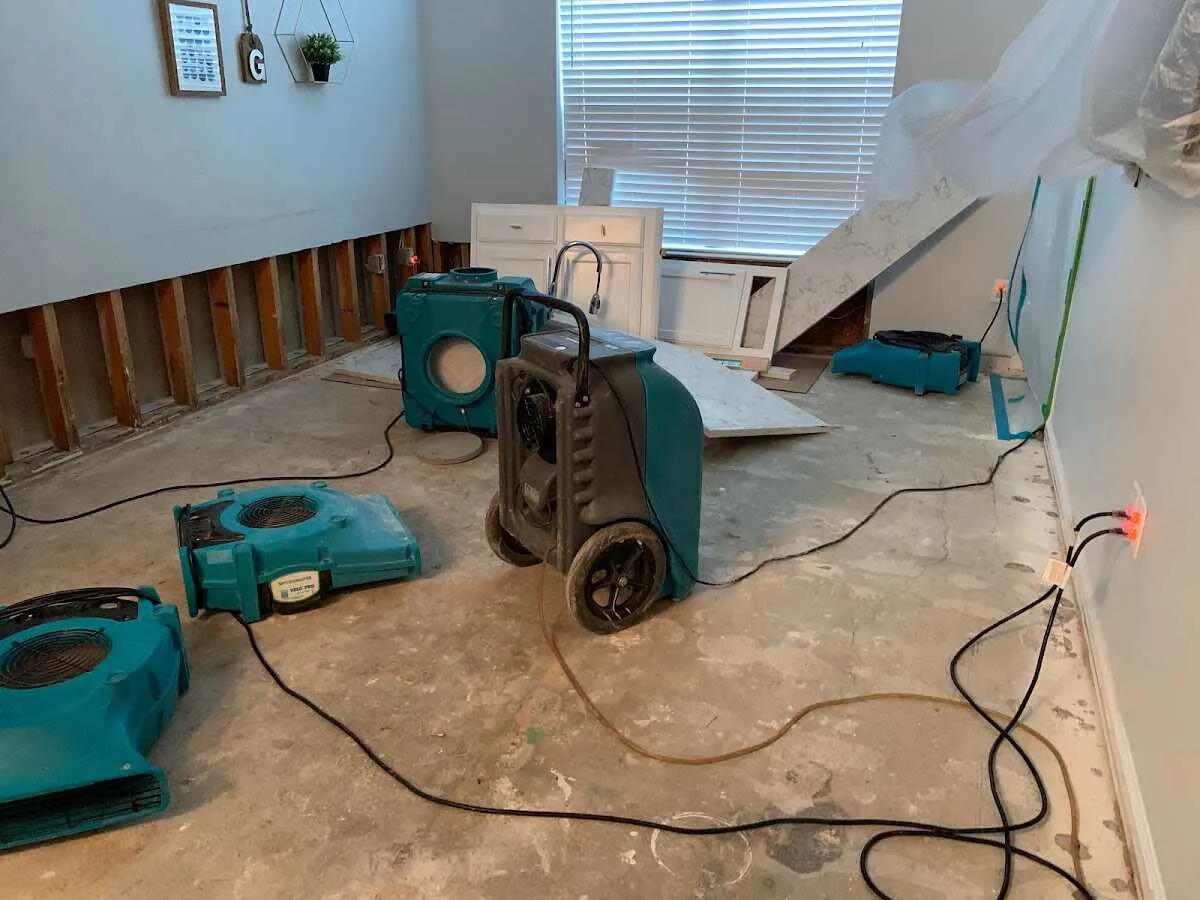 Dehumidifier in flood-cut room for Water Damage Restoration in Amity